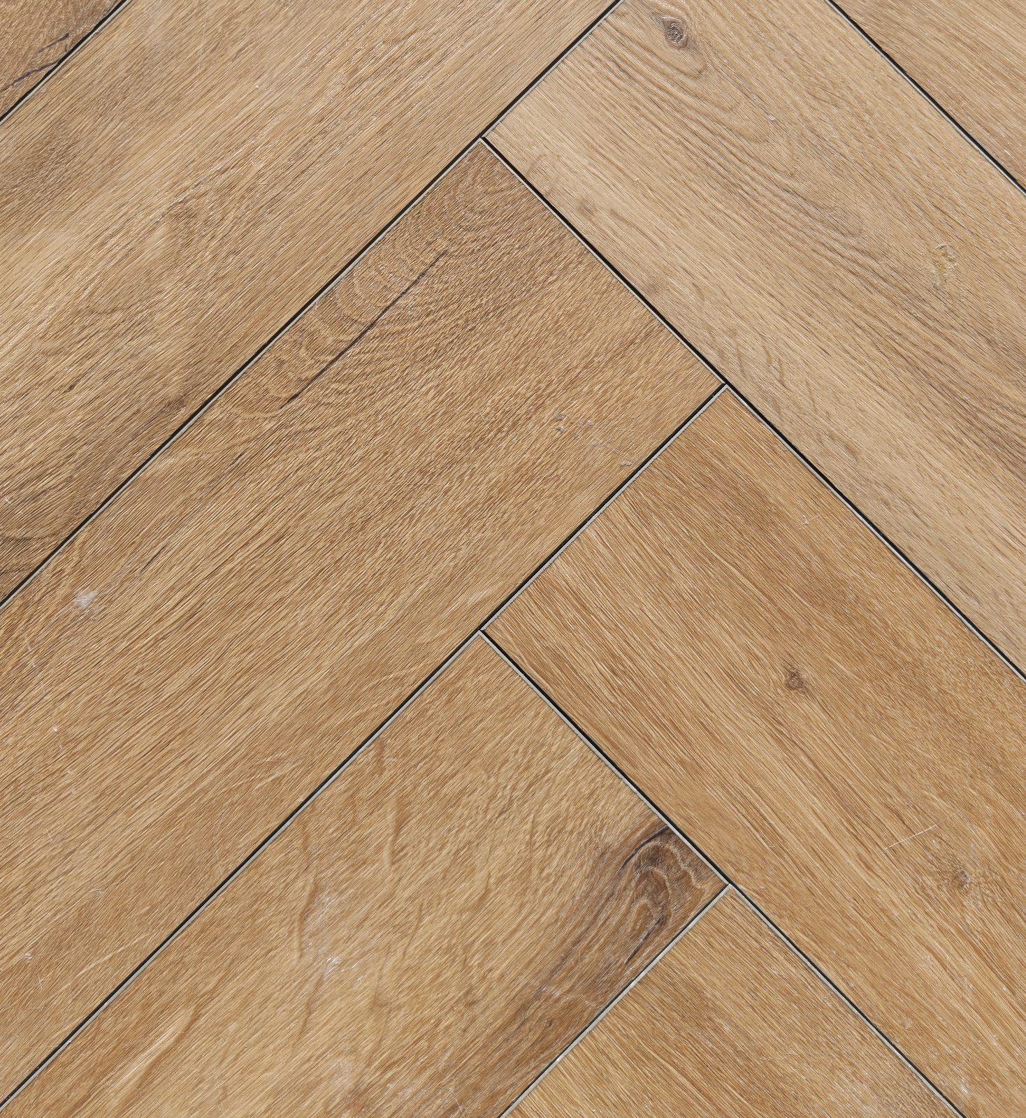 TechFloor Atlantic Visgraat 24200: visgraat PVC vloer in warme honingkleurige eiken-look met knoesten